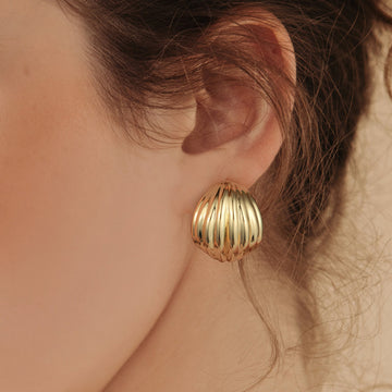 Golden, curved chocolate shaped earrings
