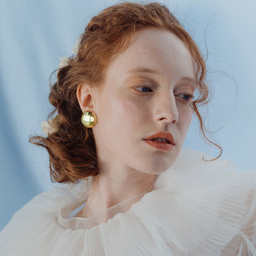 Golden, hemispherical checkered earrings