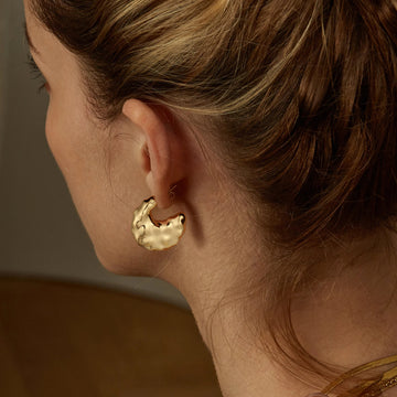 Golden, fat moon earrings