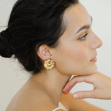 Golden-colored, angular earrings
