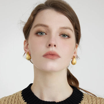 Golden, mango shaped earrings