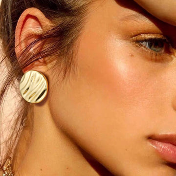 Golden, round disc ripple earrings