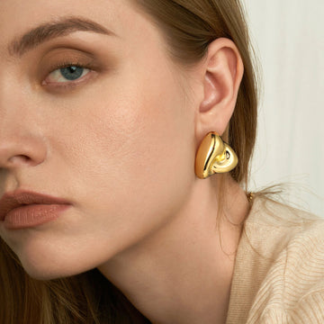 Golden, triangular rice and vegetable roll shaped earrings