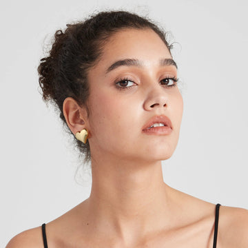 Golden, pointed heart-shaped earrings