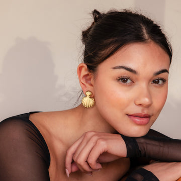 Golden-colored, large and small shell earrings