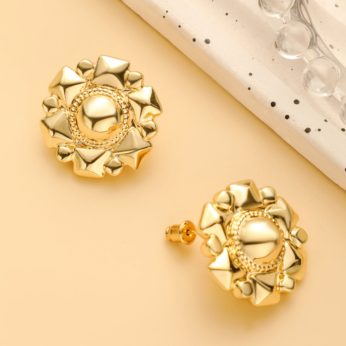 Golden-colored, angular earrings