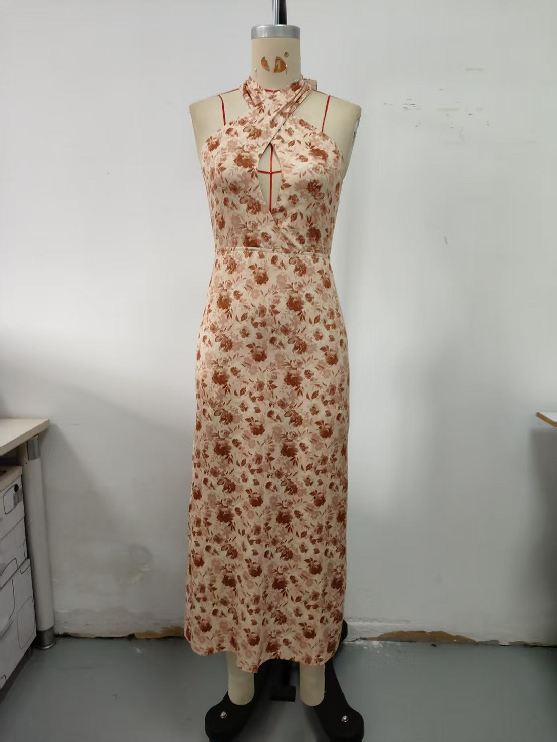 Apricot colored cross neck dress, long, floral pattern
