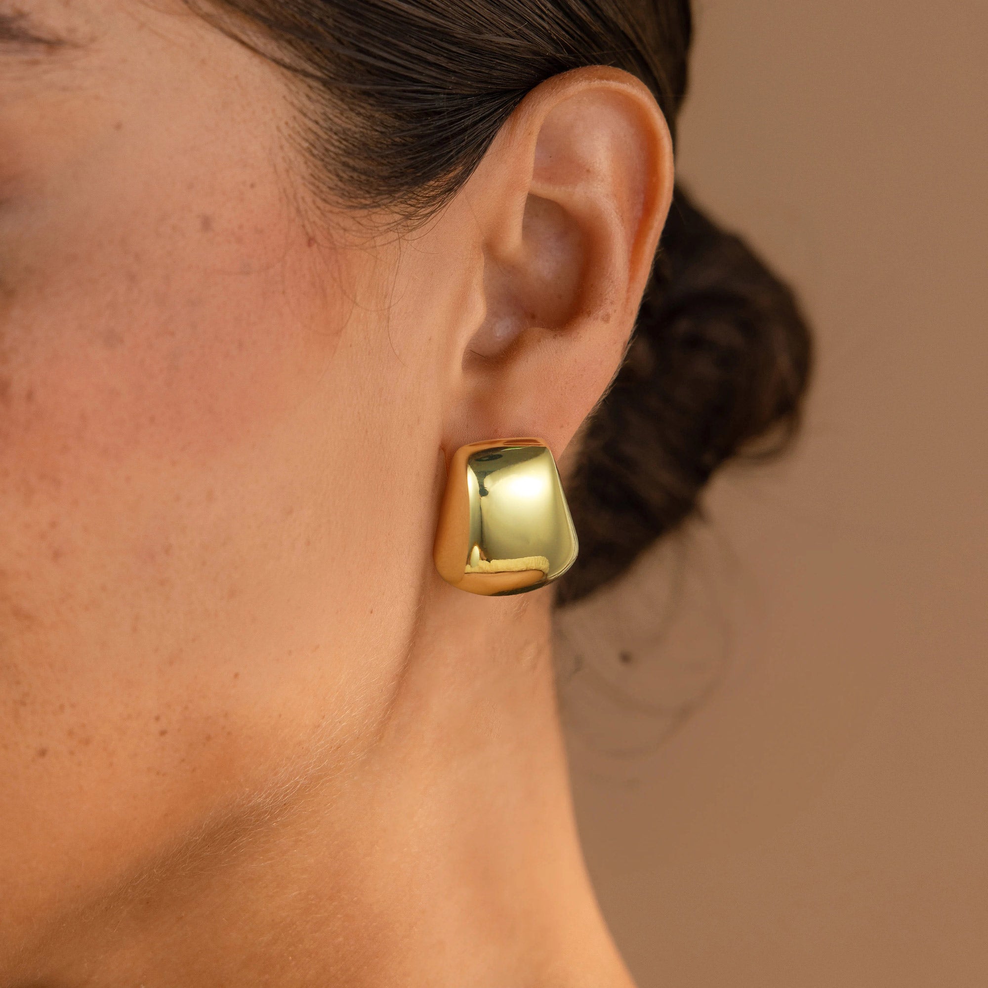 Golden, round axe head earrings