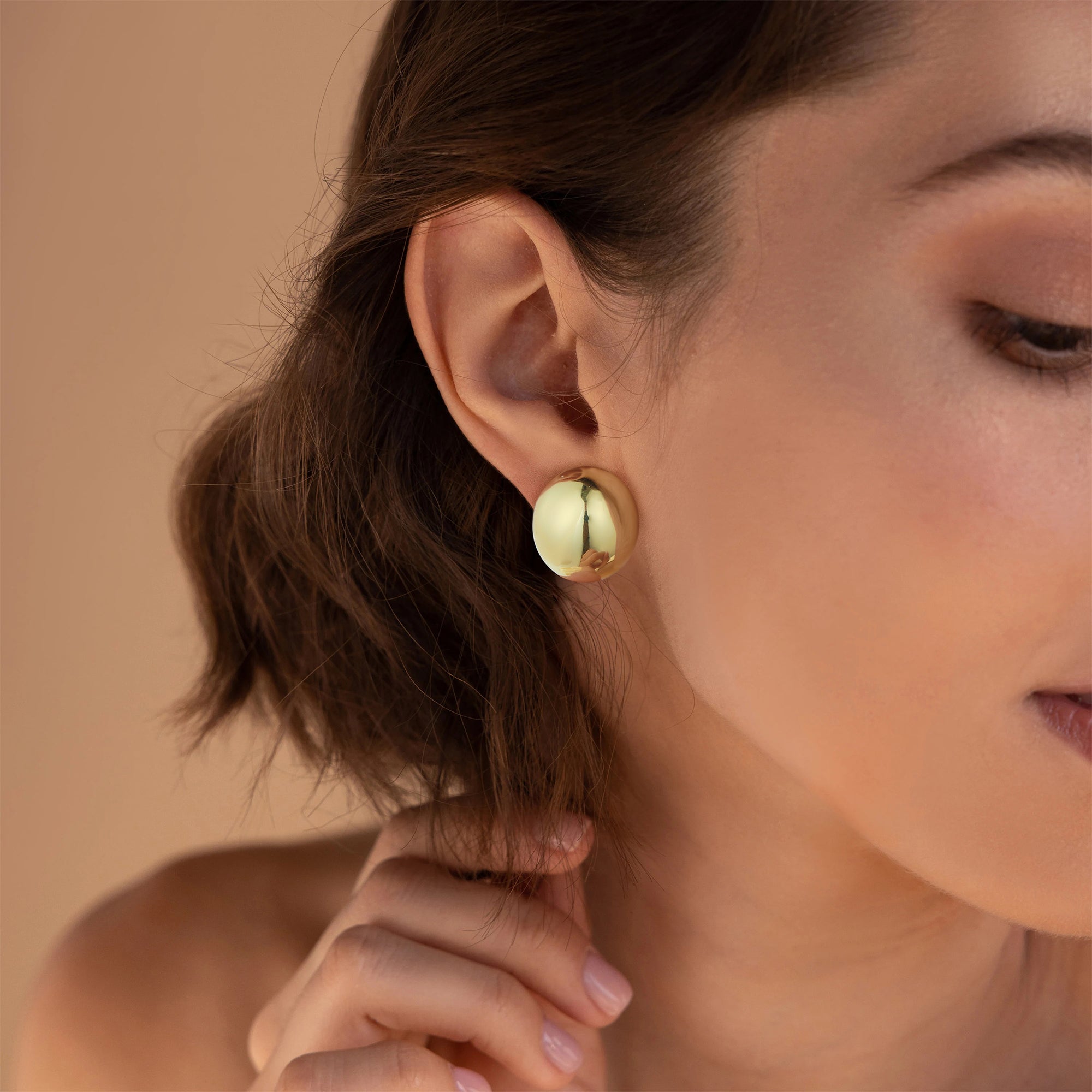 Golden, full round ball earrings