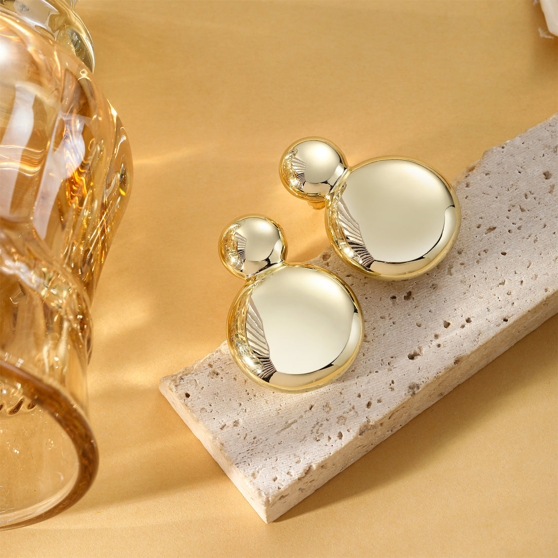 Golden, gourd-shaped earrings