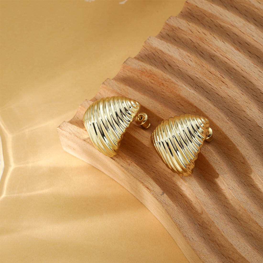Silver/Golden, horizontal striped candy-shaped earrings