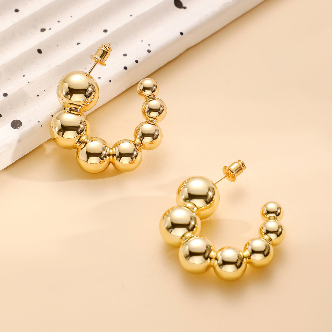 Golden, bubble hoop earrings