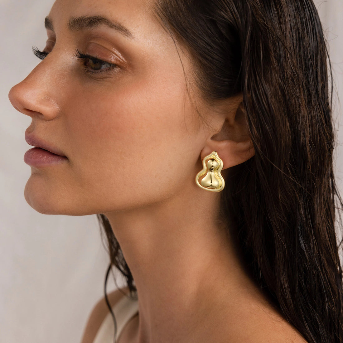 Golden/silvery, gourd-shaped bottle earrings